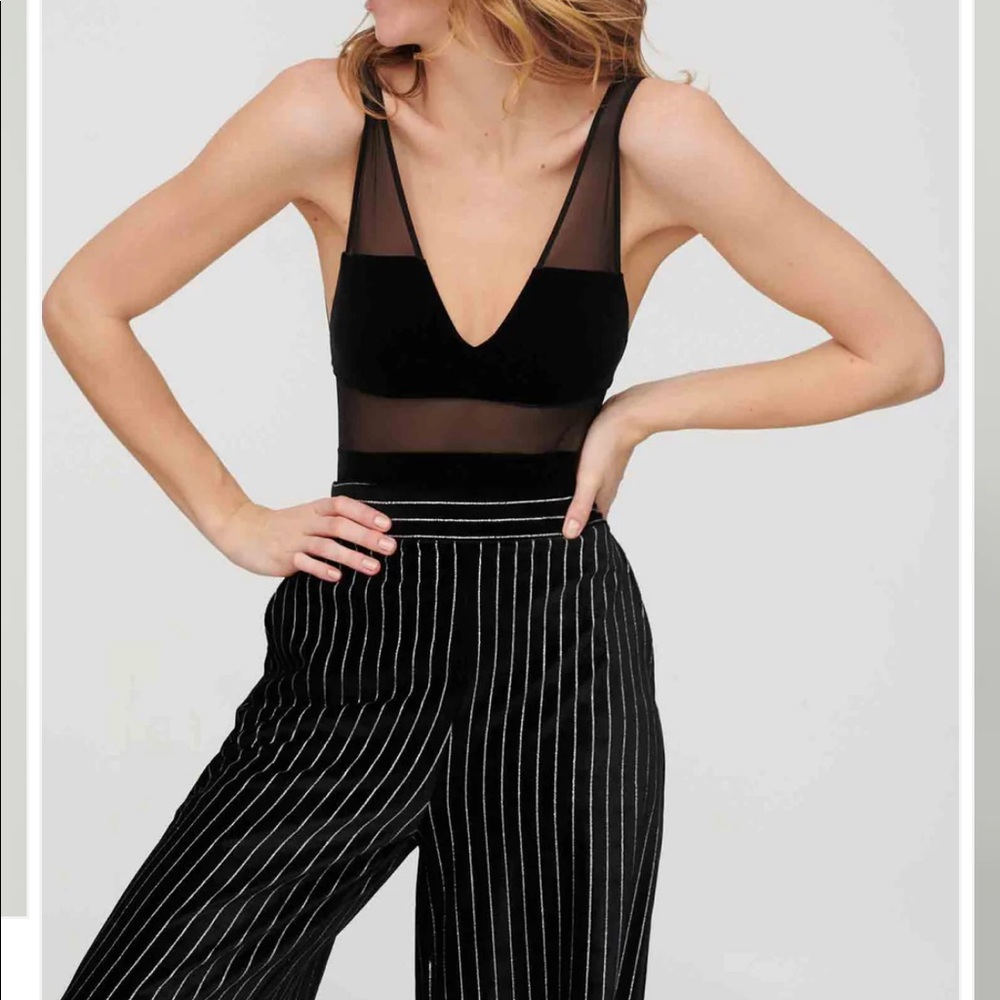 Undress code black bodysuit